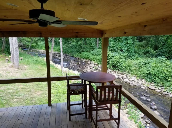 Log Cabin on the River cabin at White Lotus Eco Spa Retreat, Stanardsville, VA — photo 9 of 30