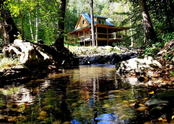 Log Cabin on the River cabin at White Lotus Eco Spa Retreat, Stanardsville, VA — photo 2 of 30